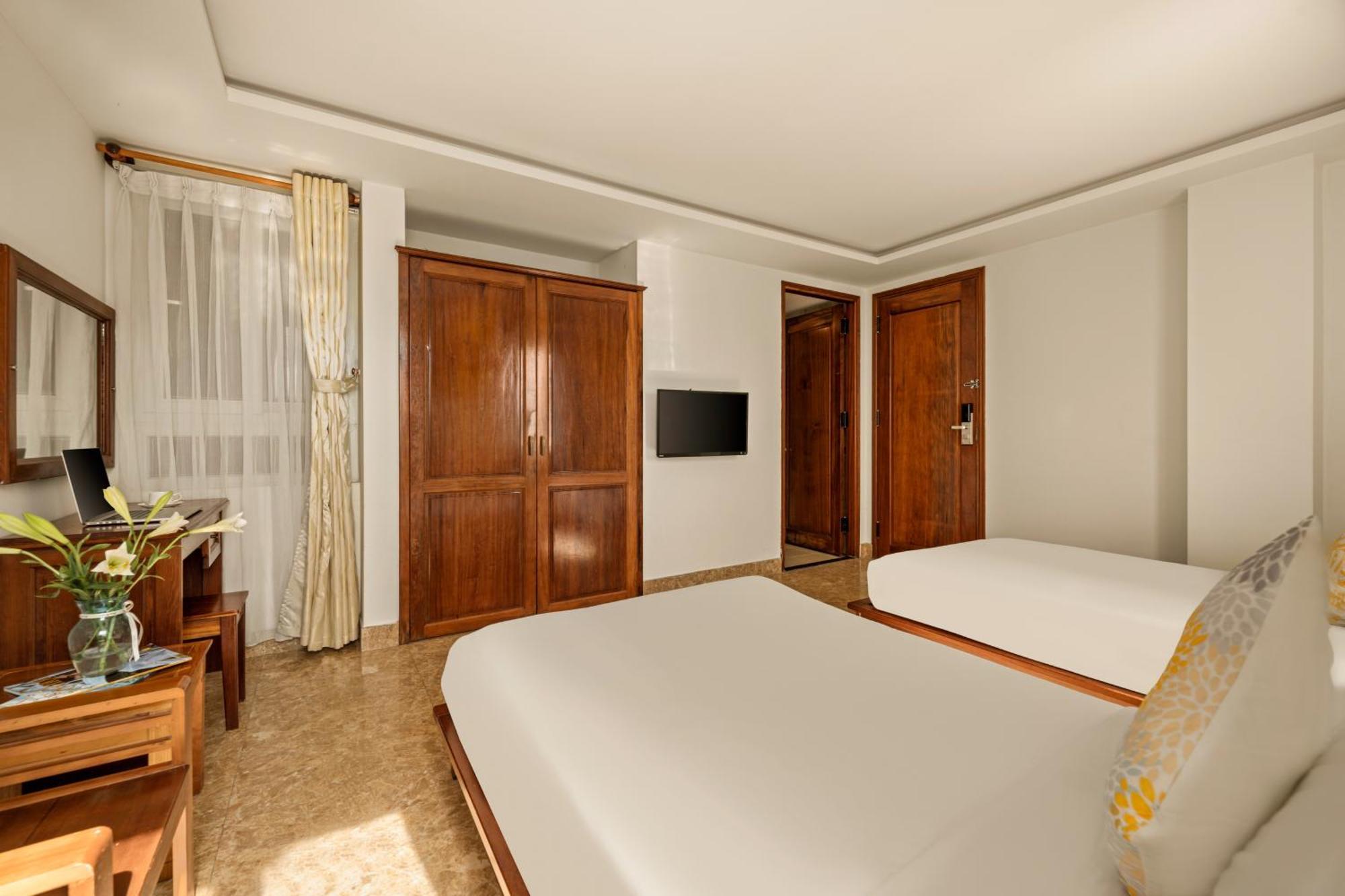 Titan Hotel Дананг Экстерьер фото