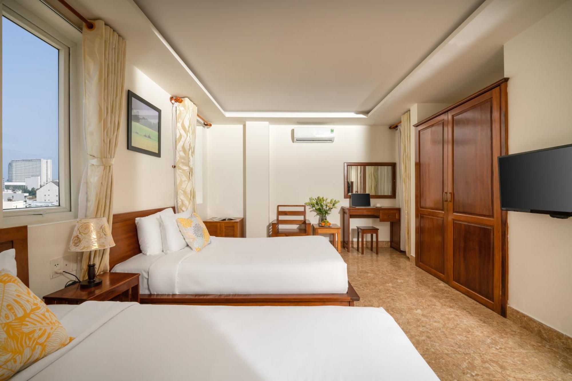 Titan Hotel Дананг Экстерьер фото